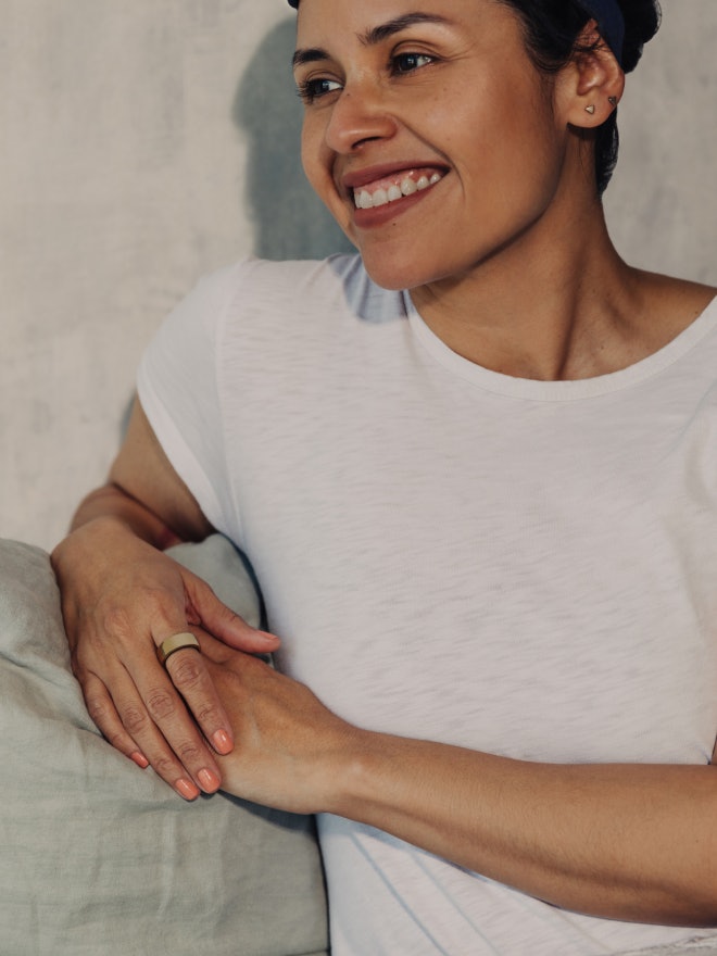 Picture of a person holding a piece of fabric over their head